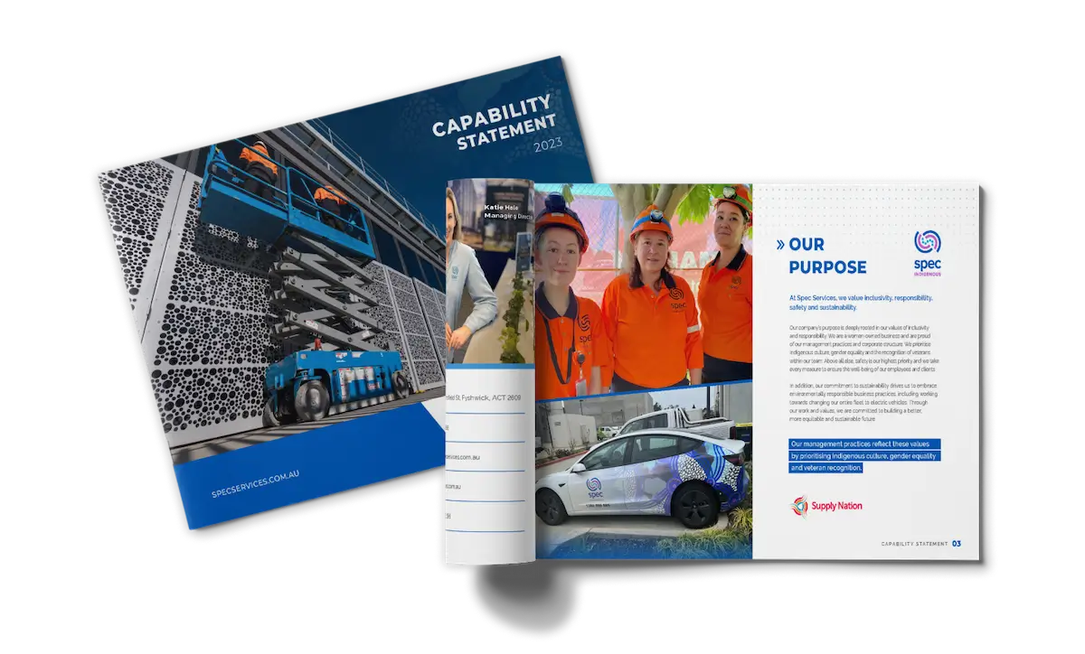 Two company brochures are open. The cover features industrial imagery and the title "Capability Statement 2023." Inside, there are photos of workers in orange safety gear and a branded company vehicle.
