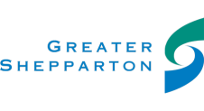 Logo for Greater Shepparton featuring the words "Greater Shepparton" in blue text, next to a stylized blue and green swirl design.