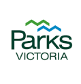 Parks Victoria logo featuring the word "Parks" in large green letters, "VICTORIA" below in smaller green letters, and two zigzag chevron lines above in green and blue, representing hills or mountains.